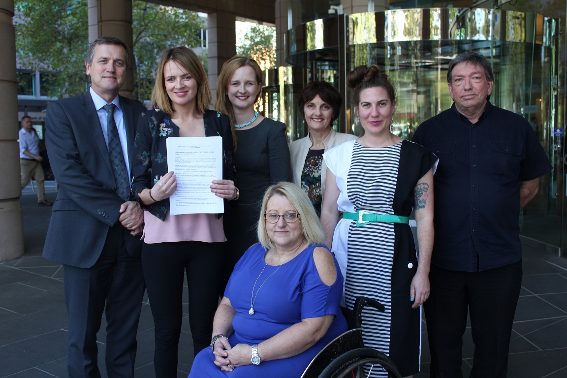 Representatives from six of the disability organisations that signed the joint statement.